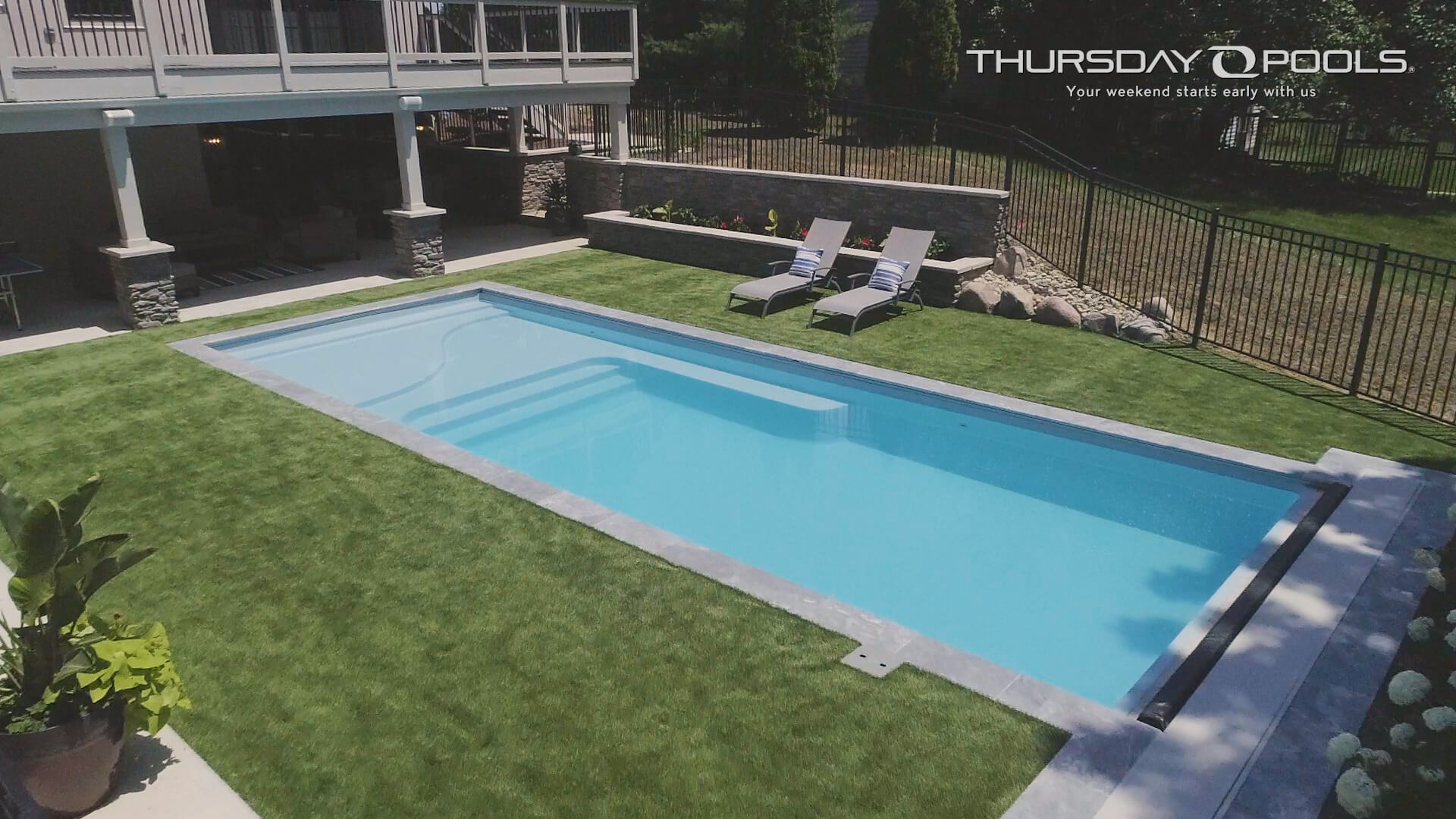 Thursday Pools side view of Lil Bob LX pool with turf surrounding pool