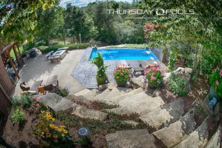 Thursday Pools Lil Bob pool with stone stairs and landscaping