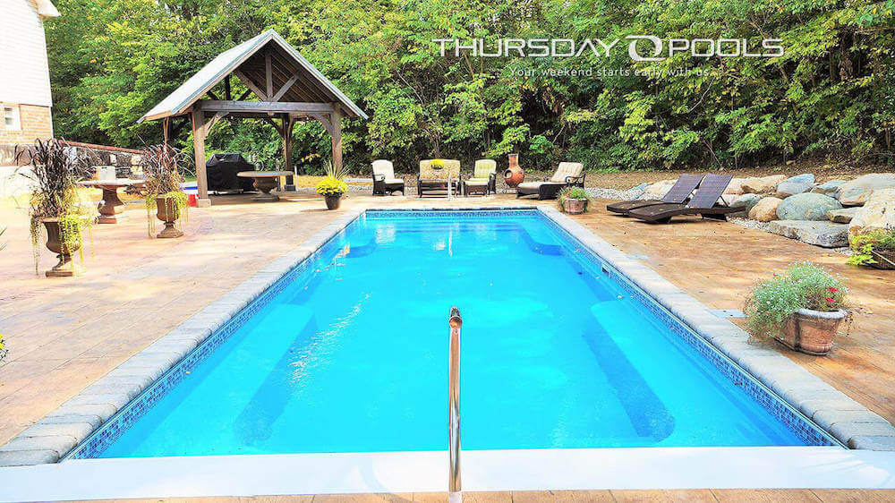 Front area view of Spirit Pool with Thursday Pools logo.