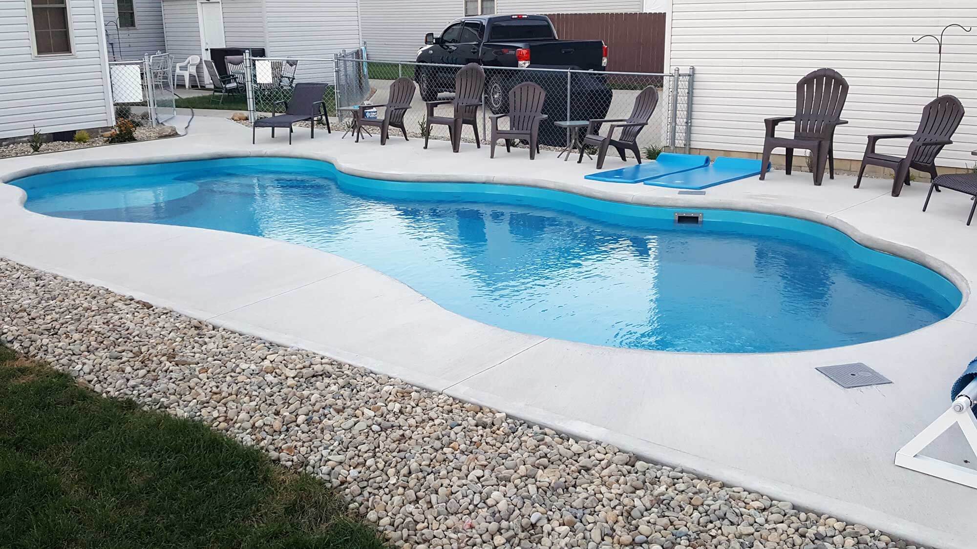 Thursday Pools Wellspring pool with white patio