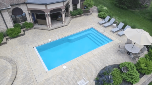 Lower Aerial wide shot of Thursday Pools Lil Bob pool