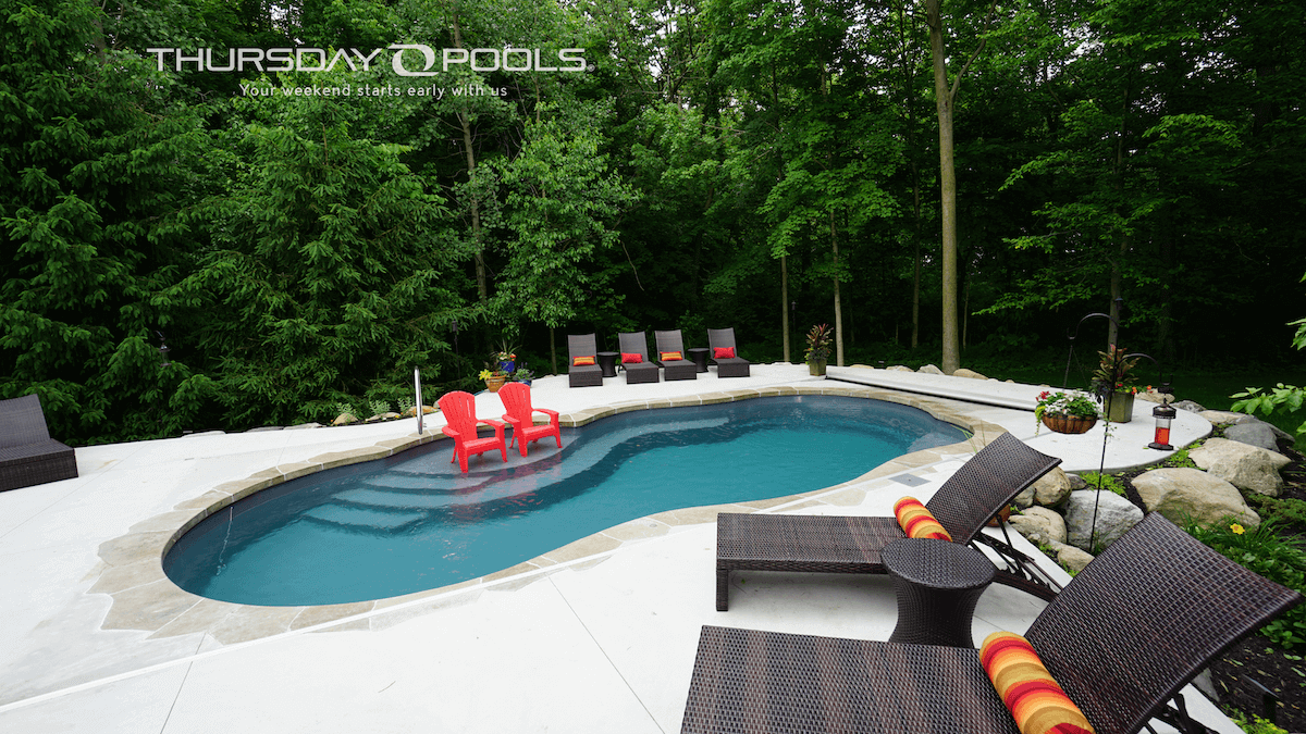 Thursday Pools Sun Day Pool with red chairs in pool