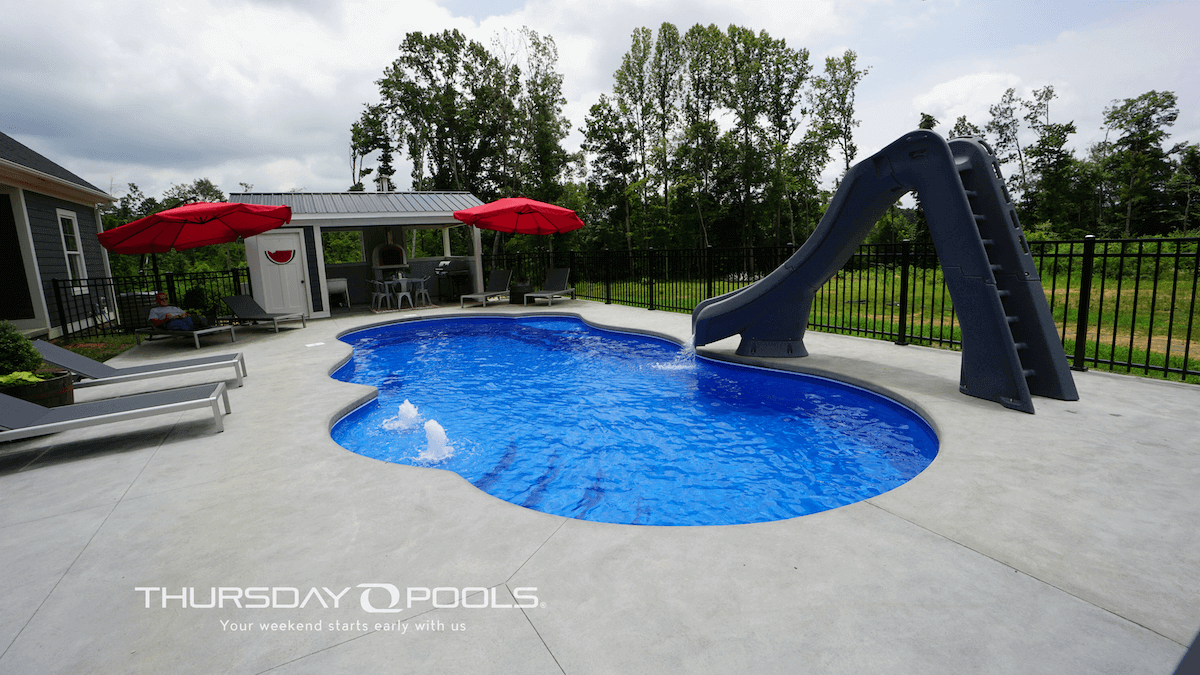 Thursday Pools Sun Day Pool with water slide and water features