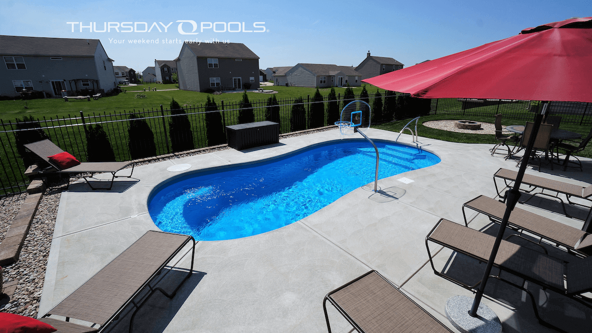 Thursday Pools Titus Pool with basketball hoop and red umbrella