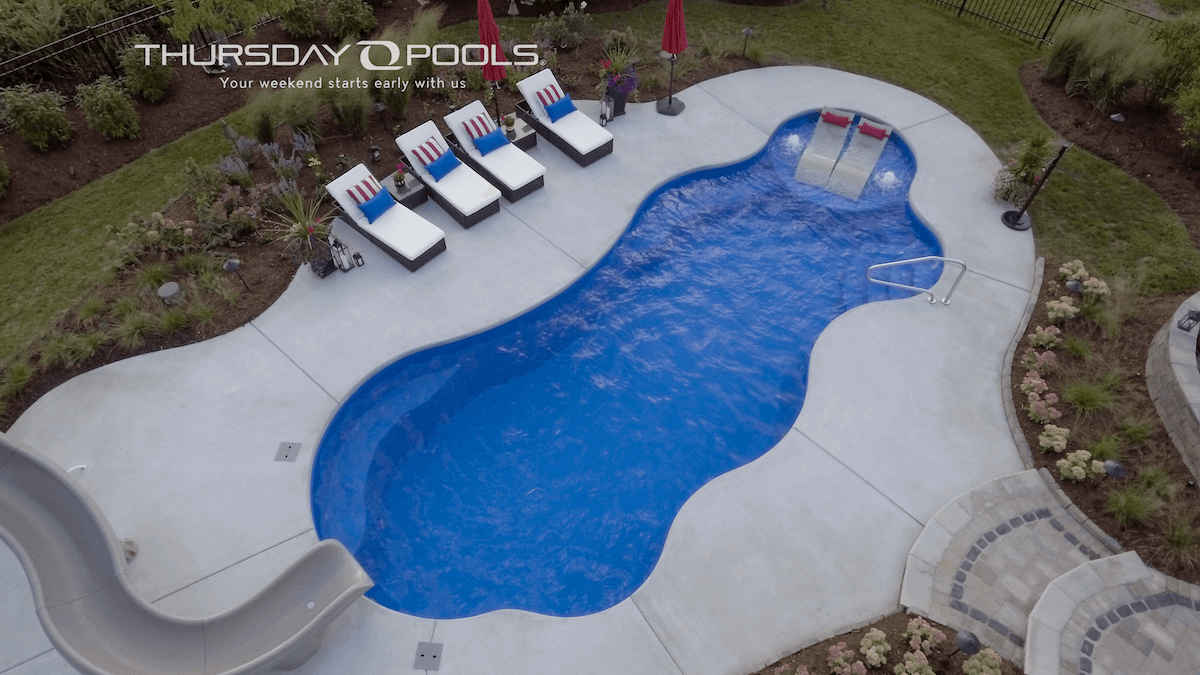 Thursday Pools aerial view of Wellspring Pool with lounge chairs and water features
