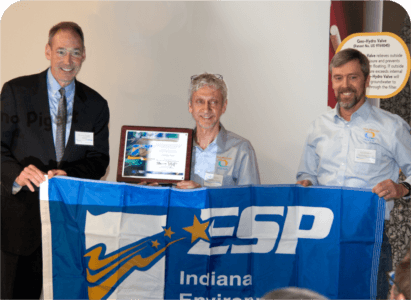 Thursday Pools photo of workers holding up award and ESP banner