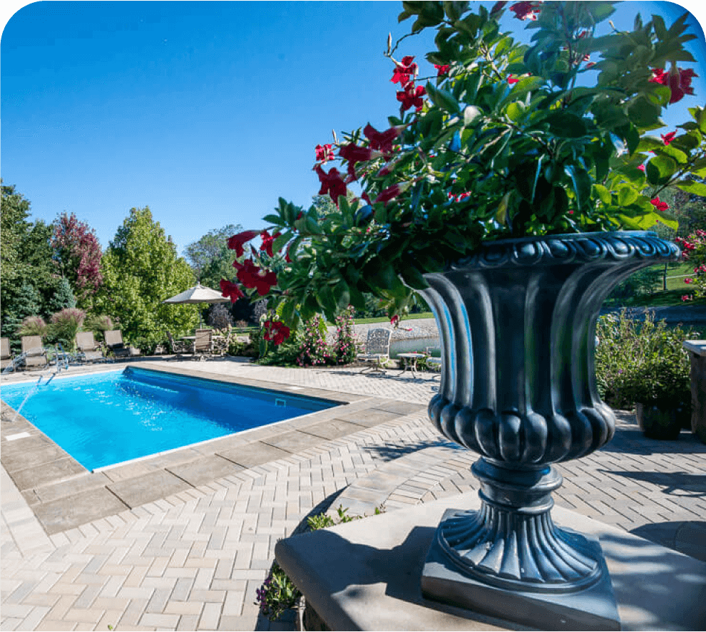 Thursday Pools Landscaping with pool in background