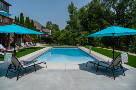 Thursday Pools side view CARIBBEAN SPARKLE with a beach entry and bench seating